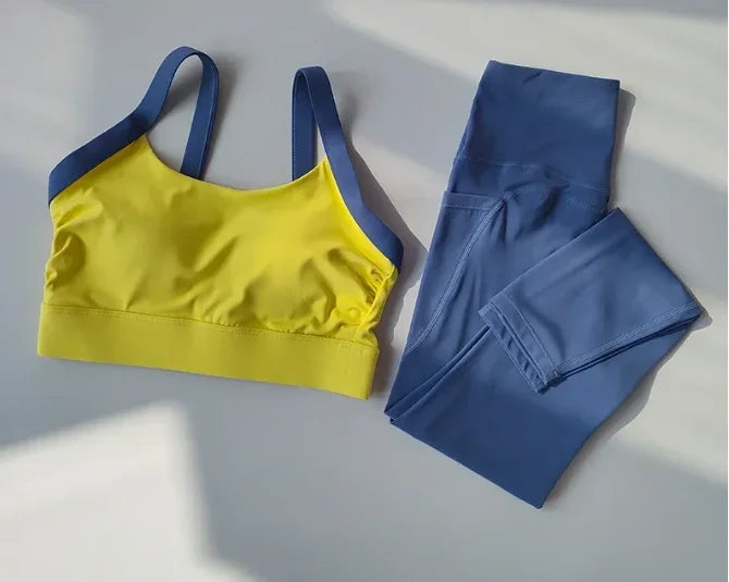 NUOYING Conjunto de Yoga 2 Piezas con Bloques de Color de Alta Intensidad, Sujetador Deportivo con Espalda Cruzada y Mallas de Cintura Alta con Efecto Levantamiento para Entrenamiento Diario