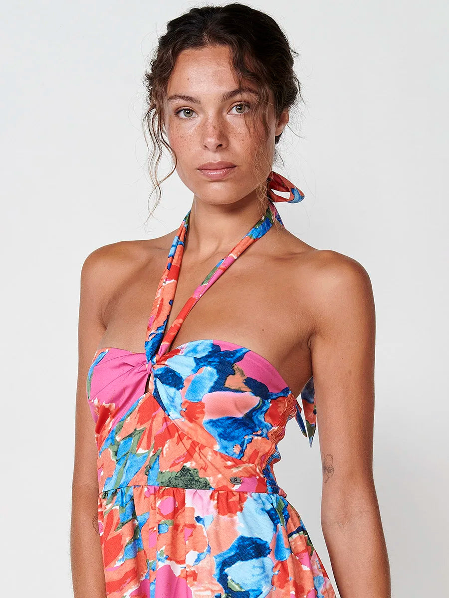 Vestido Largo con Estampado Floral y Cuello Halter de Koröshi para Mujer, con tejido ligero 100% poliéster, espalda abierta fruncida y elegante estilo bohemio, perfecto para eventos de verano y fiestas.