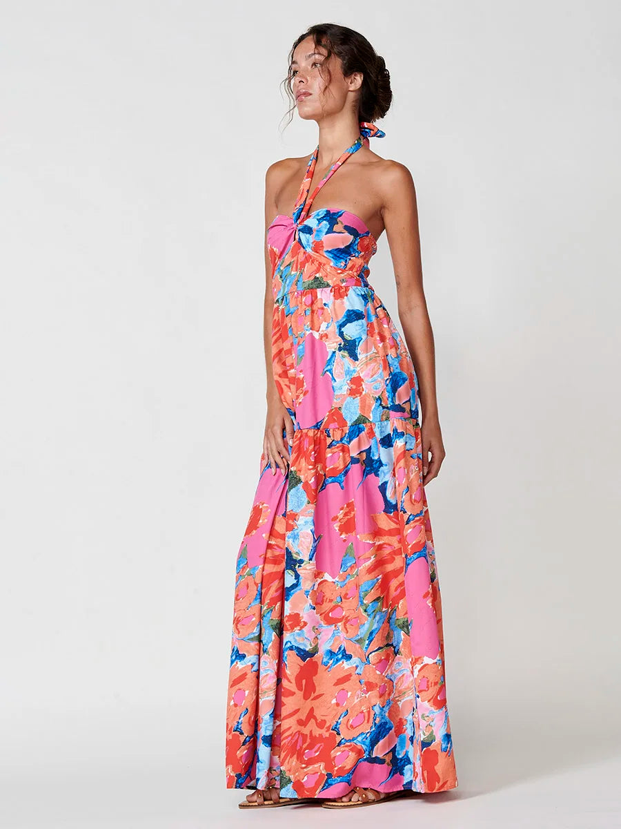 Vestido Largo con Estampado Floral y Cuello Halter de Koröshi para Mujer, con tejido ligero 100% poliéster, espalda abierta fruncida y elegante estilo bohemio, perfecto para eventos de verano y fiestas.